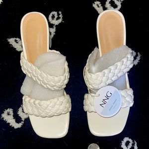 Woman heeled, woven block square toe leather strappy sandals